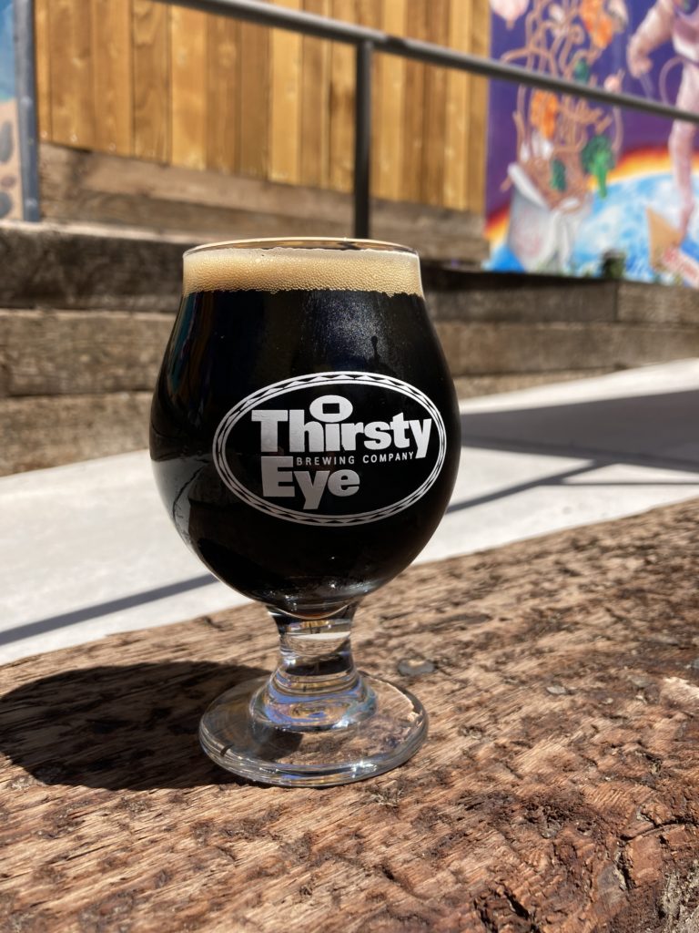 dark beer in a goblet glass